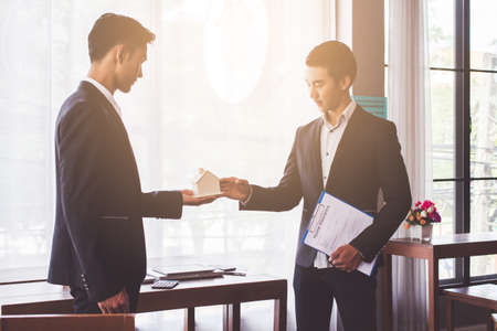 Asian people Giving new house in future success.business conceptの写真素材