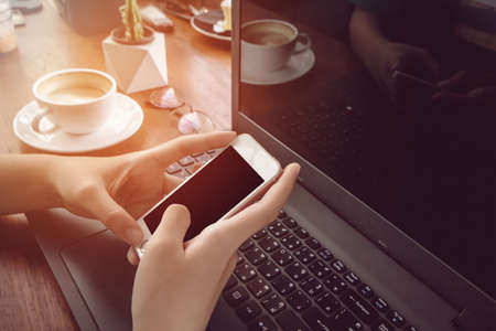 Close up of men hands holding touching mobile phone with blank copy space for your text message in...