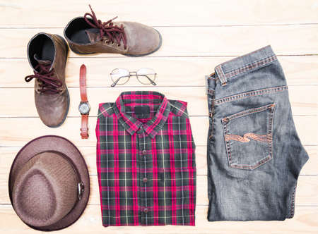 Casual apparel and accessories on a background of wood.Top viewの写真素材