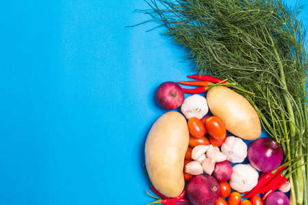 Organic fresh colorful vegetables with potatoes, tomatoes,coriander,chilli, shallots, garlic....