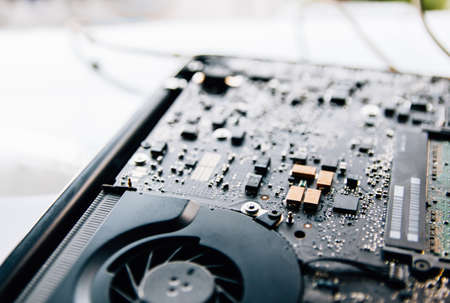 Electronic control panel, Repairs laptop (pc, computer) motherboard. Installs the equipment (cpu) .の写真素材