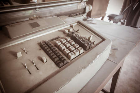 Old retro classic typewriter on wood.vintage toneの写真素材