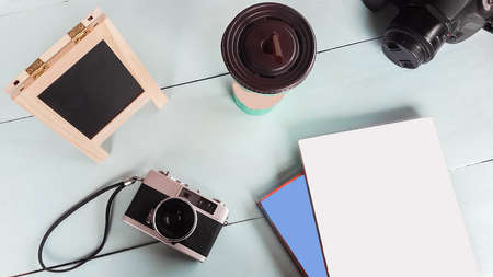 The old camera has a notebook and coffee table on the green.の写真素材