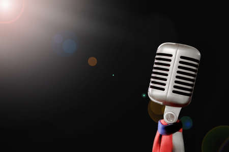 Soft focus,Microphone Vintage Retro technology, equipment on the stage show, classical music, with light.の写真素材