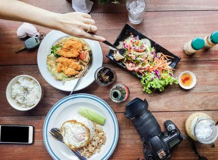 Top view. lunch, rice and eggs, salads, vegetables, shrimp on the table.の写真素材