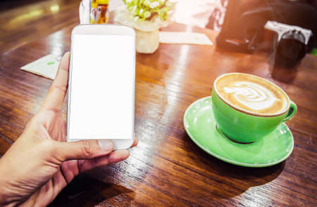 Close up of men hands holding touching mobile phone with blank copy space for your text message in...