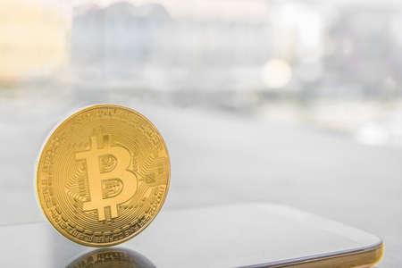 Bitcoin on Smartphone-screen . Bitcoin in trading concept rendering concept. の写真素材