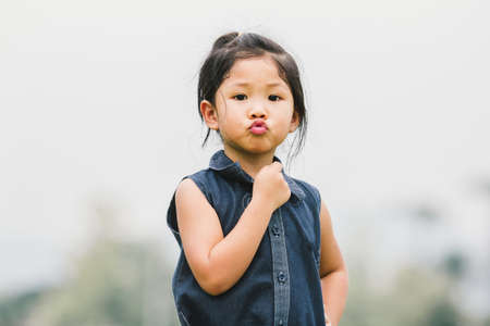Portraits, children, people of Asian face funny.
