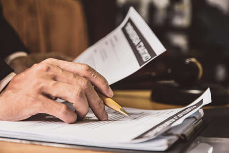 businessman or lawyers sitting office signing contract papers on wood table. Law of advisor Concepts...