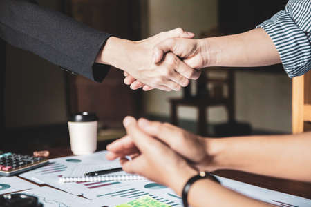 Group asia business women together create a mutually beneficial business relationship. Economic...