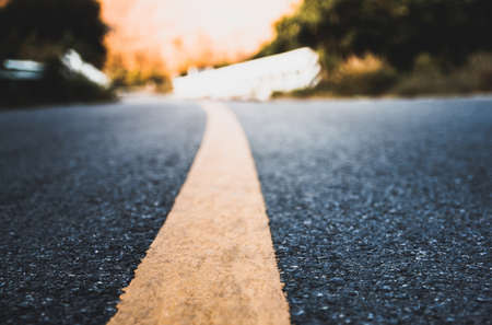 long road to the mountains in Muang Lamphun Thailand .Landscape with  sunset sky and beautiful in the eveningの写真素材