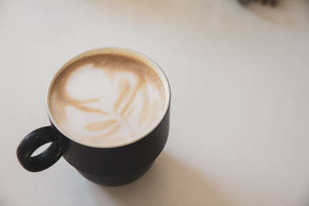 coffee of cup  on white table of wood copy space for youe textの写真素材