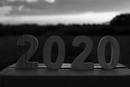 Blac and white,  2020 Happy New Year of wooden number on box with sky and cloud twilight beautiful nature. celebrationの写真素材