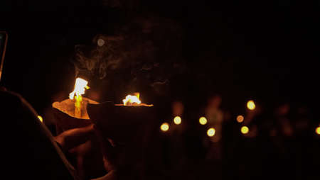 Blur candles in the dark background.の写真素材