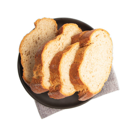 Sliced bread on black dish isolated white background.