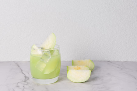 iced guava juice  on the glass. cool refreshing fruit juice health drinkの写真素材