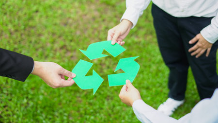 team collaboration to promote recycling,  reuse symbolizing sustainability and shared responsibility...