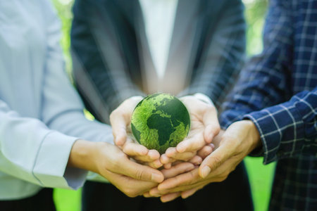 Business leaders unite for CSR initiatives to combat climate change, protect the earth and drive sustainable environmental practices globally.の写真素材