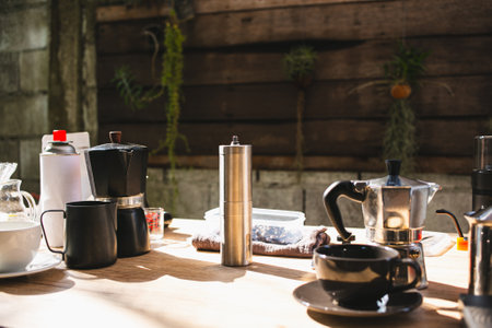 Coffee making equipment and tools include moka pot, milk frother, a coffee grinder, glass, portable...