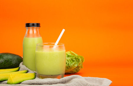 fresh avocado smoothie with green cos salad,  healthy drink conceptの写真素材