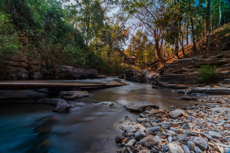 rafting spot on the Mae Wang River in Chiang Mai Province. The river flows, surrounded by rocks and mountains, captured beautifully with  wide-angle lens. tourist attraction in Chiang Mai, Thailand.の写真素材