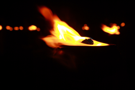 Fire flames on the pots is located in the darkの写真素材