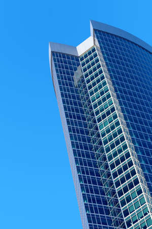Skyscraper on a background of the blue sky