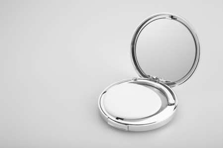 Open silvery packing of the compact powder, isolatedの写真素材