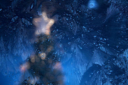 The New Year tree image behind frosty glassの写真素材