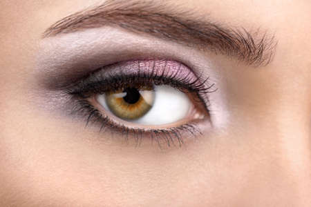 Close up of a female right eye with a bright make-upの写真素材