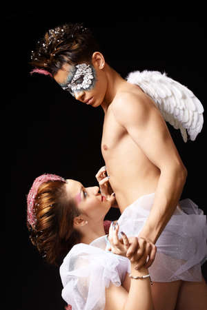 Sexual dance of pair enamoured, isolated on a black background
の写真素材