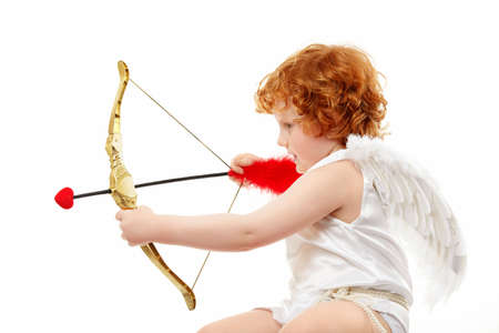 Profile of the aiming small cupid isolated on a white backgroundの写真素材