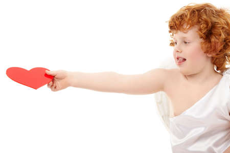 Small happy cupid holds heart on an outstretched arm, isolatedの写真素材