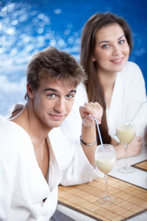 The nice guy and the girl with a cocktailの写真素材