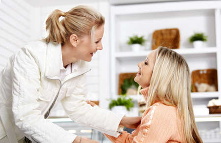 Two young girls embrace at a meeting
の写真素材