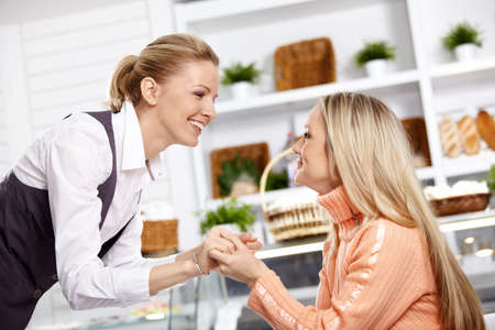 Two attractive girlfriends have met in cafe
の写真素材