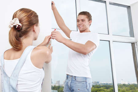 She gives the pencil a young man
