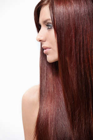 Attractive girl with long hair isolatedの写真素材