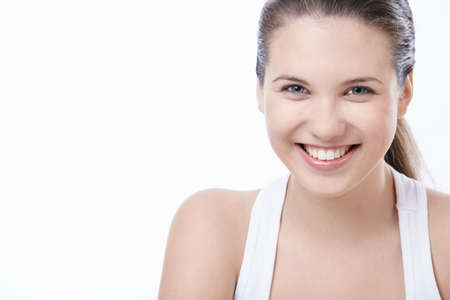 Young smiling girl on white backgroundの写真素材