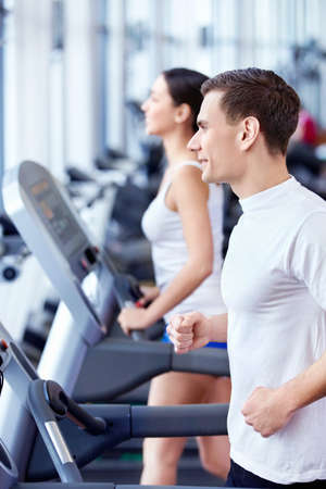 Young attractive people in the fitness clubの写真素材