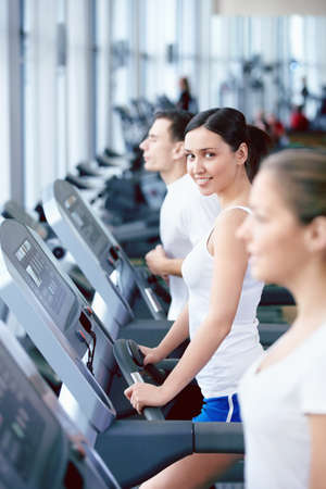 Young attractive people in the fitness clubの写真素材