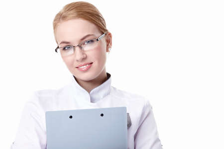 A young woman with a clipboard e on a white backgroundの写真素材