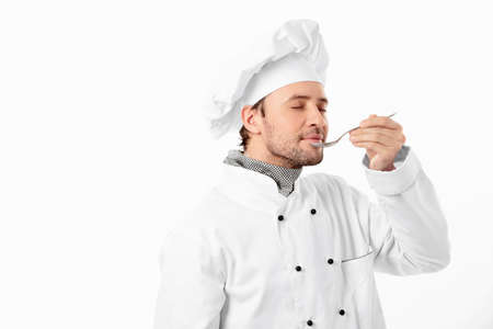 Cook with spoon on white backgroundの写真素材