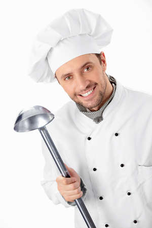 Cook with ladle on a white backgroundの写真素材
