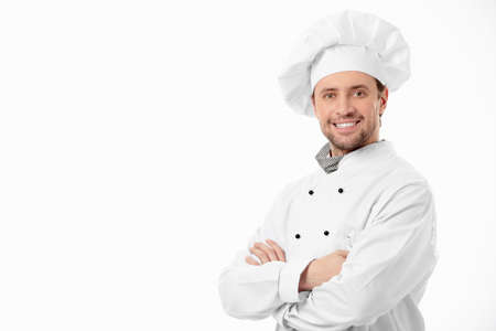 Attractive smiling chef on a white backgroundの写真素材
