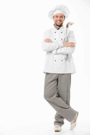 The cook with a ladle on a white backgroundの写真素材