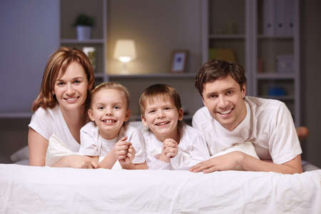 Families with children at home in the eveningの写真素材