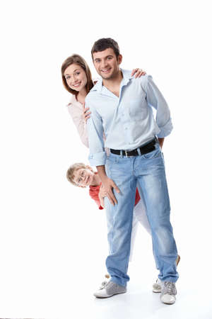 Young family with a child on a white backgroundの写真素材