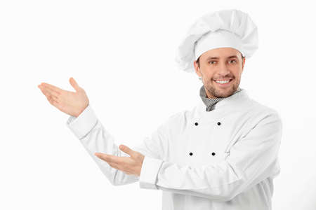 The smiling cook on a white backgroundの写真素材