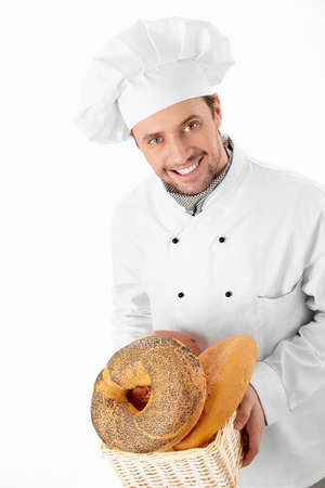 Baker of bread on a white backgroundの写真素材